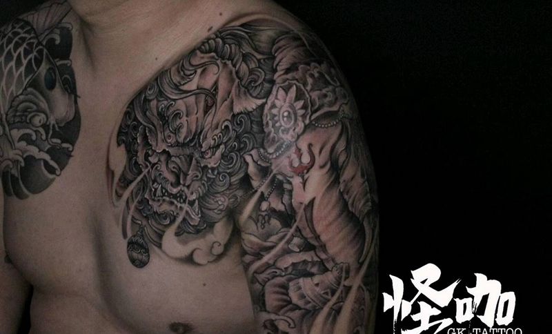 唐狮-半甲纹身图片_胸部手臂新传统纹身图案