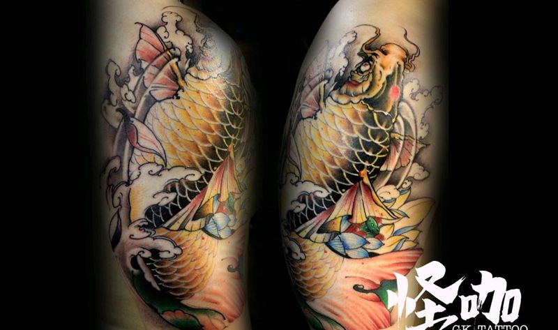 新传统鲤鱼纹身图片_手臂新传统纹身图案