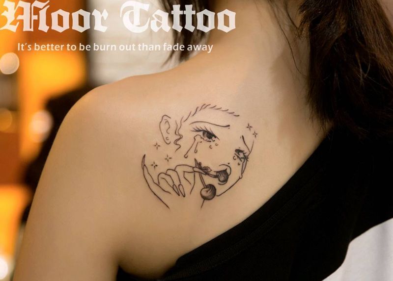 樱桃少女纹身图片_肩部清新人物成品纹身图案