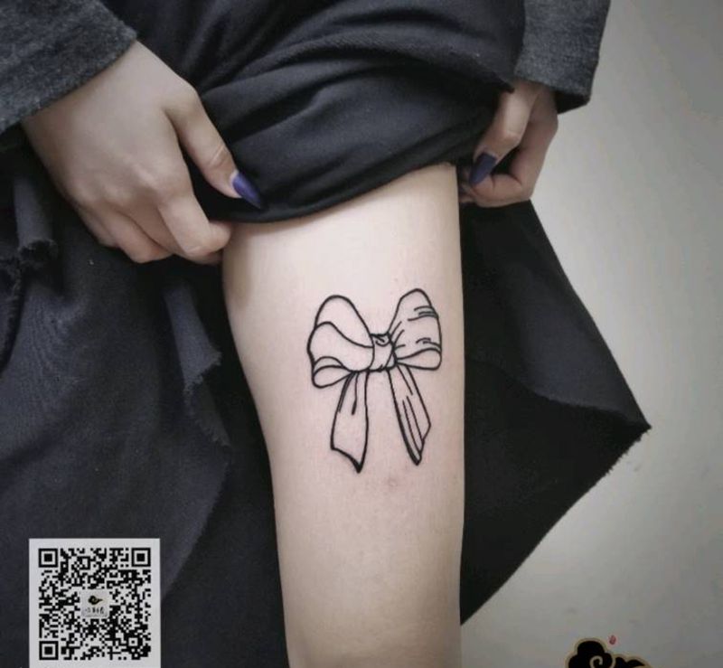 老顾客的蝴蝶结纹身图片_腿部几何图腾纹身图案