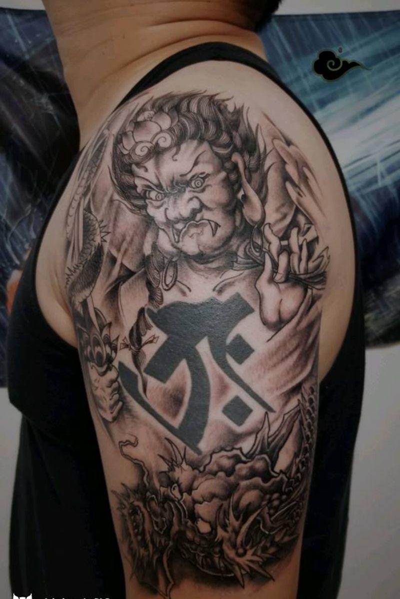 不动明王大臂添加纹身图片_龙不动明王纹身图案