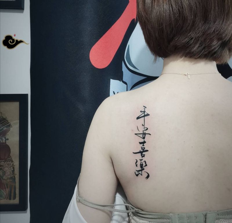 万事胜意纹身图片_背部肩部纹身图案
