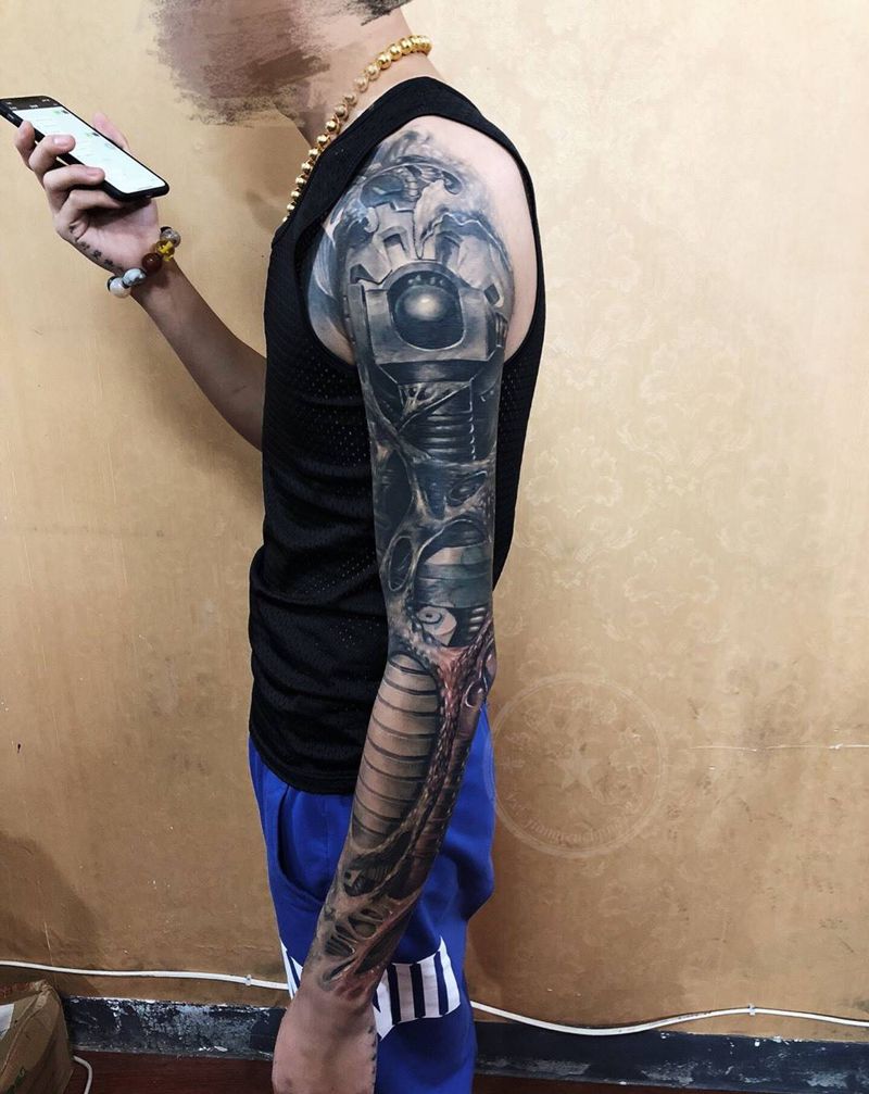 机械臂 遮盖纹身图片_手臂欧美写实机械纹身图案