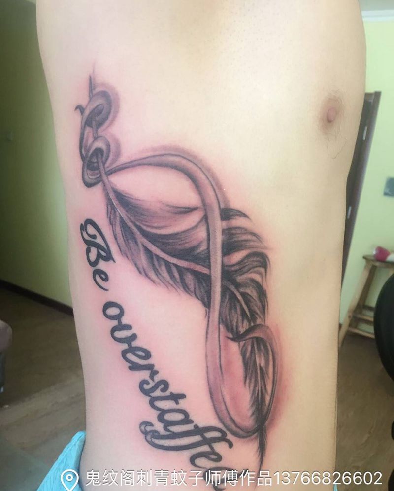 羽毛纹身图片_腰部成品纹身图案