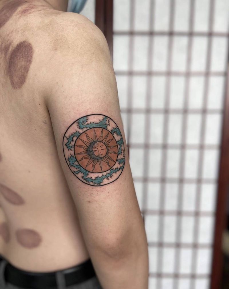 圆盘纹身图片_手臂纹身图案