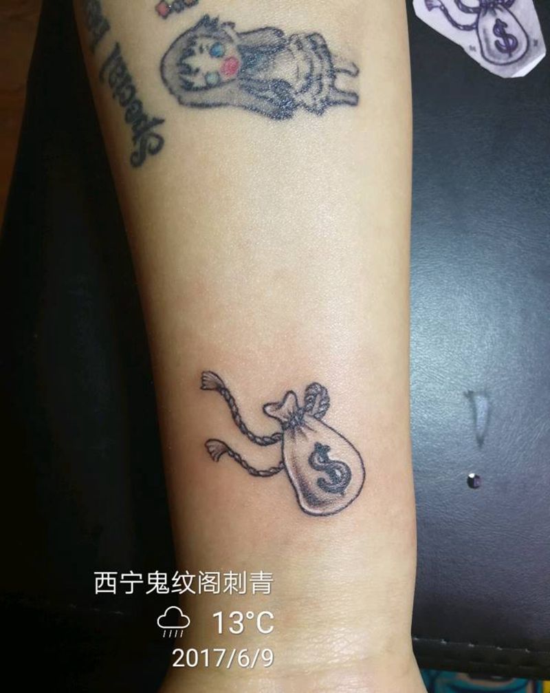 钱袋纹身图片