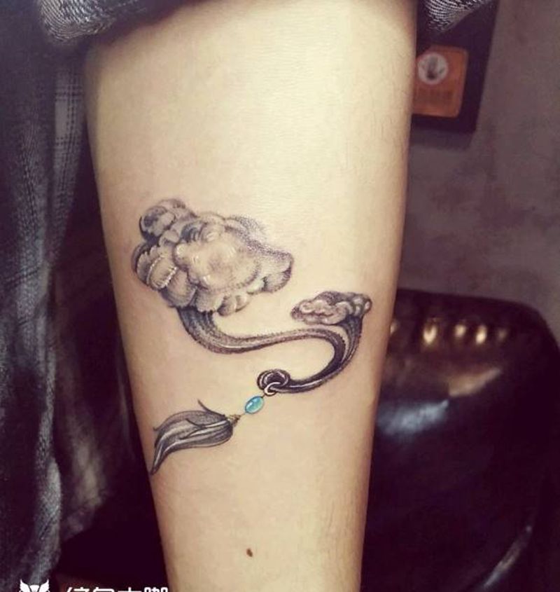 祥云如意纹身图片_手臂点刺纹身图案