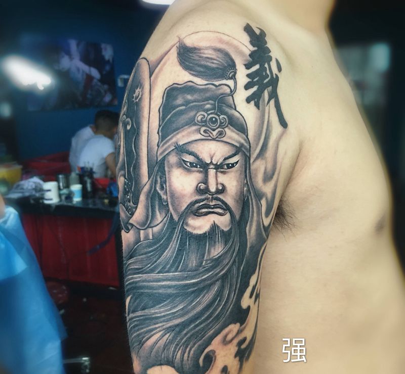 社会小哥不好惹纹身图片_手臂新传统纹身图案