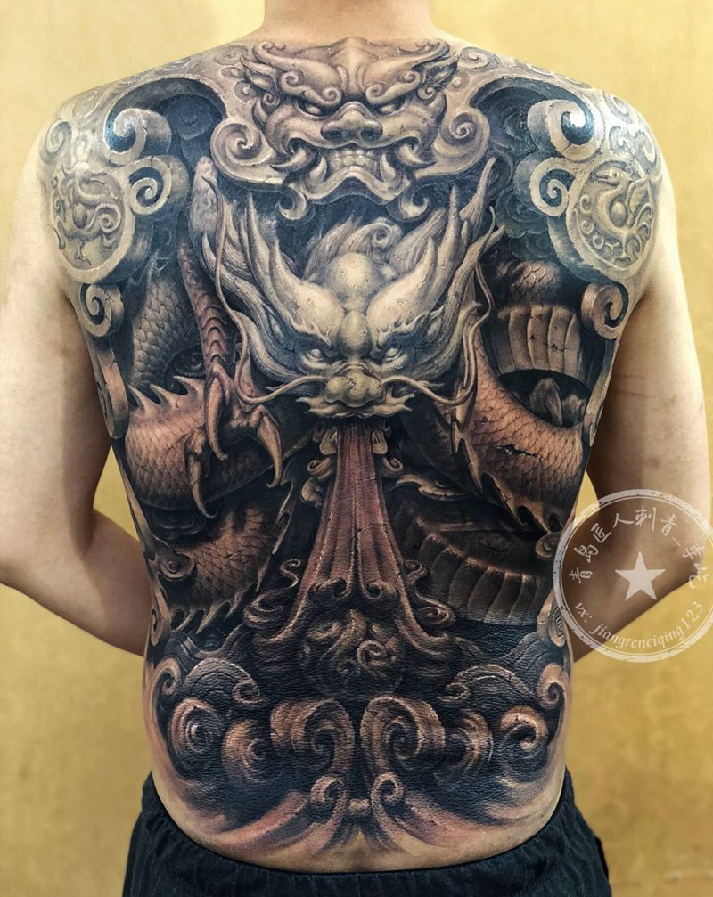 雕龙壁纹身图片_背部腰部新传统欧美写实石雕龙纹身图案