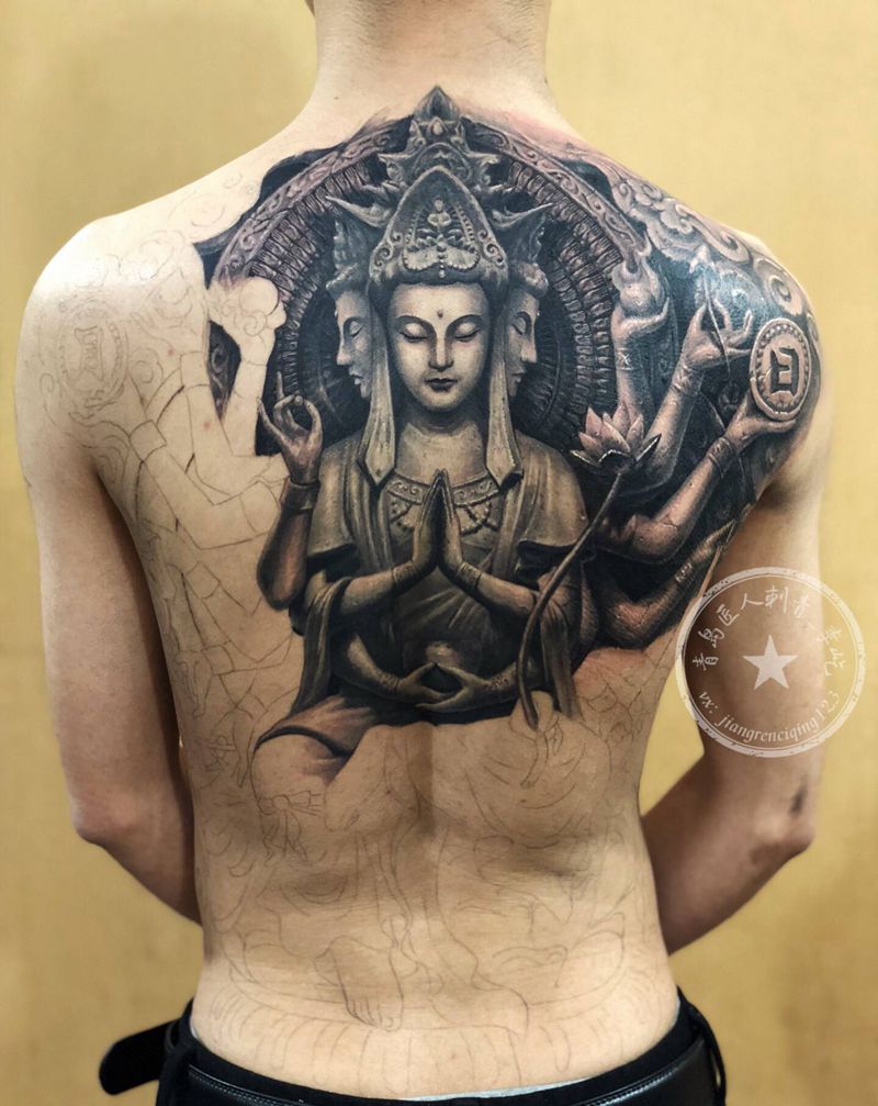 石雕千手观音纹身图片_背部腰部新传统欧美写实石雕千手观音纹身图案