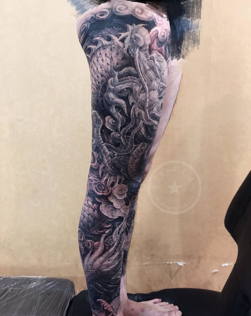 石雕龙腿纹身图片_腿部欧美写实新传统龙石雕纹身图案