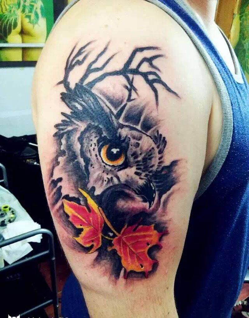 上臂猫头鹰纹身图片