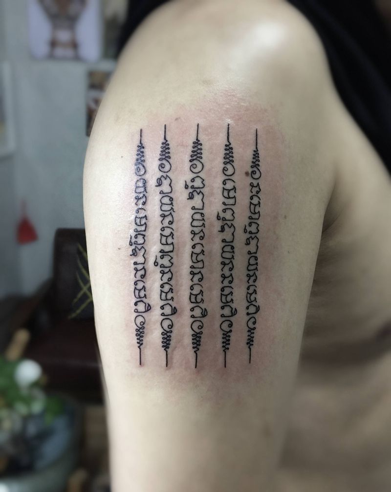 五条经文纹身图片_手臂纹身图案