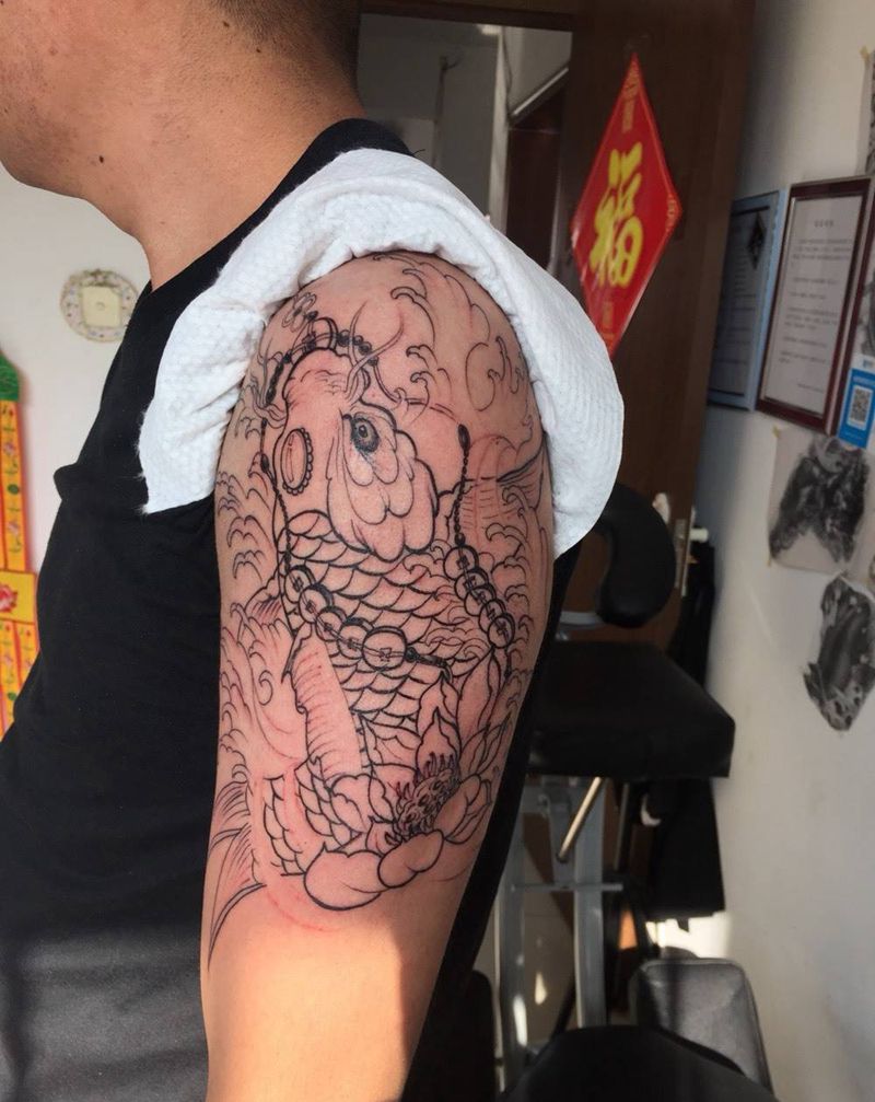 鲤鱼纹身纹身图片_手臂老传统新传统纹身图案