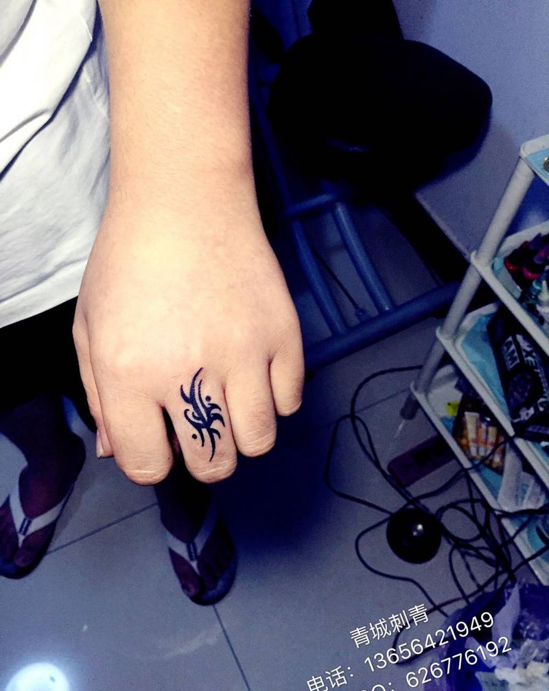 图腾纹身图片_成品手部传统清新字符图腾动物纹身图案