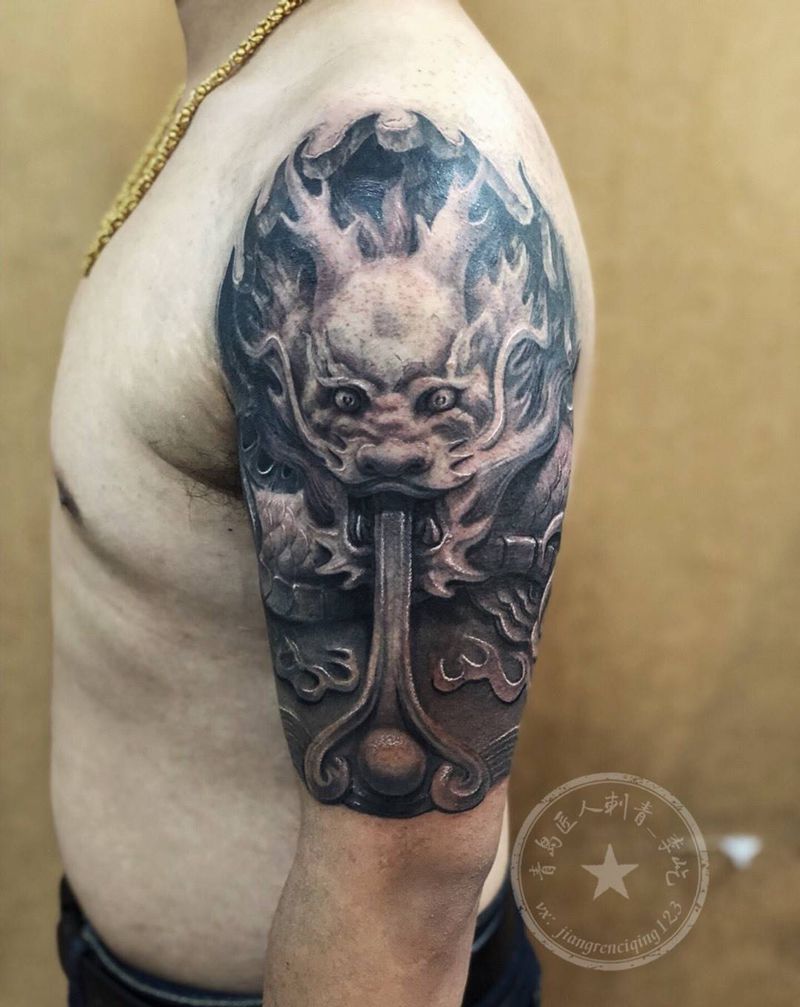 半臂石雕龙纹身图片_手臂欧美写实新传统石雕龙纹身图案