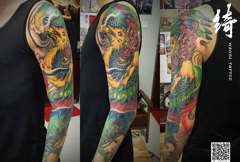 凤舞霓裳纹身图片_手臂新传统纹身图案