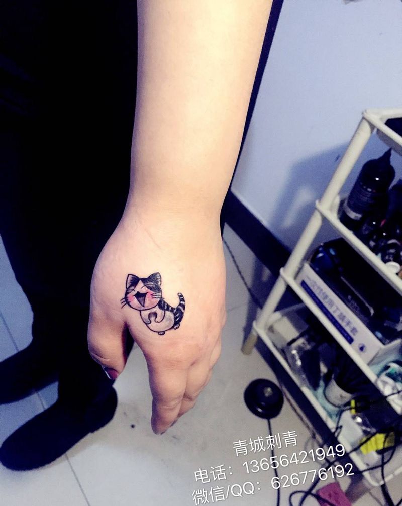 猫咪纹身纹身图片_成品手部传统清新动物纹身图案