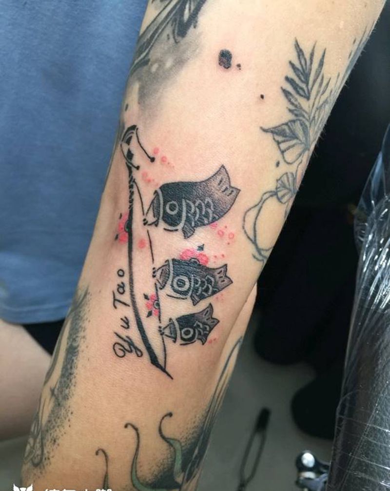 鱼旗纹身图片_手臂纹身图案