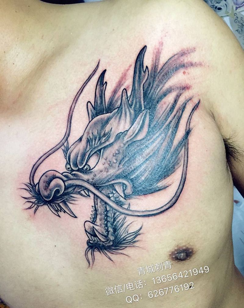 龙头纹身图片_胸部老传统纹身图案