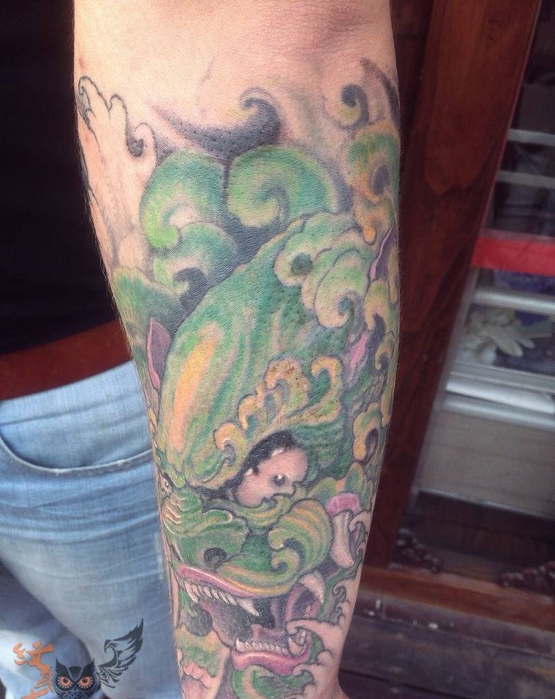 嘎巴拉 唐狮子纹身图片_成品手臂传统鬼神动物宗教纹身图案