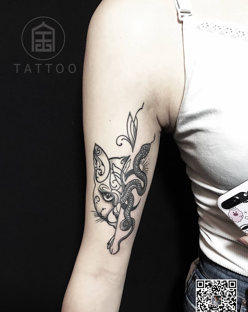 蛇~猫纹身图片_手臂蛇猫纹身图案