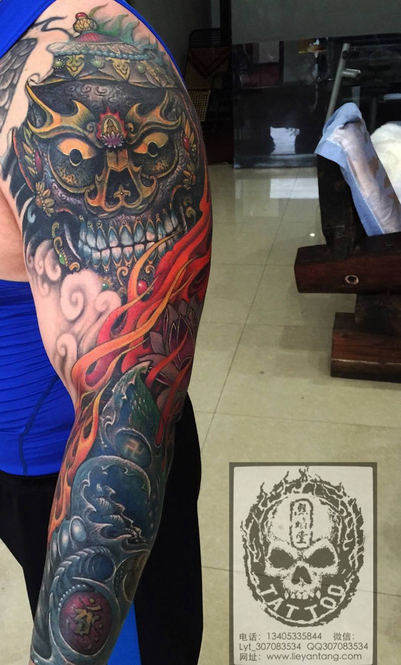 烈焰嘎巴拉纹身图片_成品手臂肩部传统宗教鬼神原创遮盖作品修改纹身图案