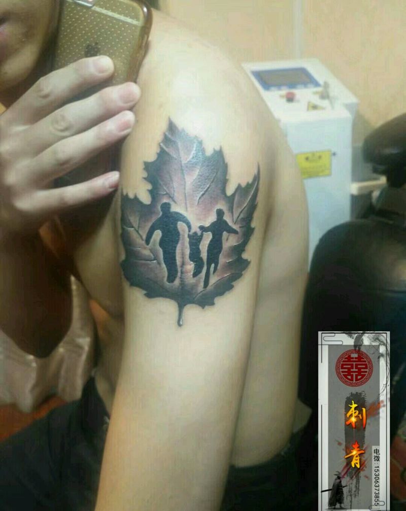 家纹身图片_手臂肩部叶子家庭纹身图案