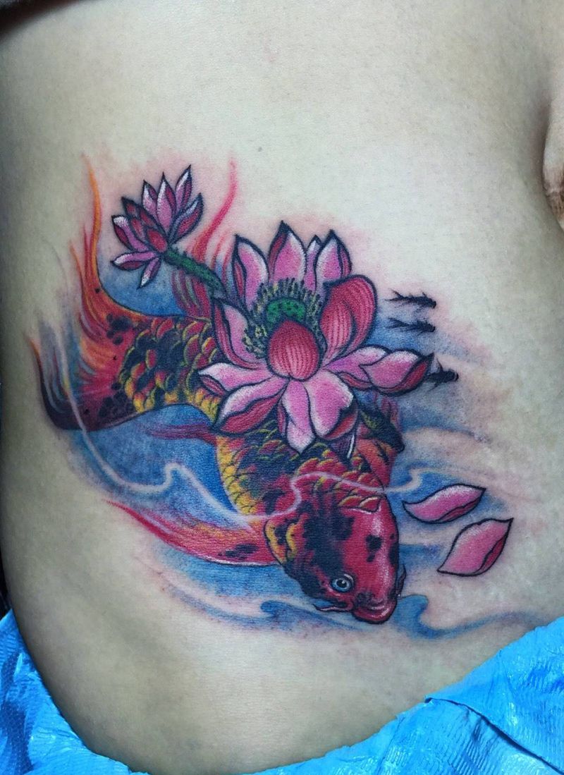 莲鱼纹身图片_成品腹部传统动物原创遮盖作品修改纹身图案