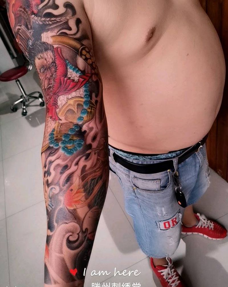 斗战胜佛花臂纹身图片_手臂新传统纹身图案