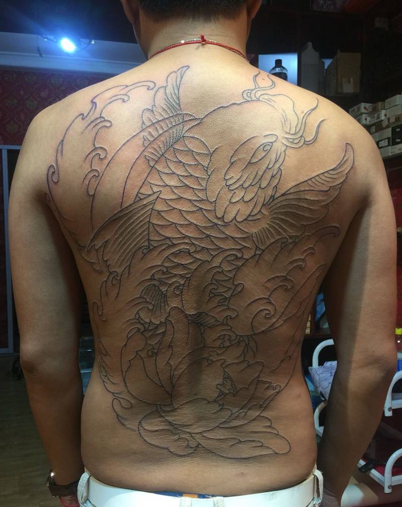 鱼半甲纹身图片