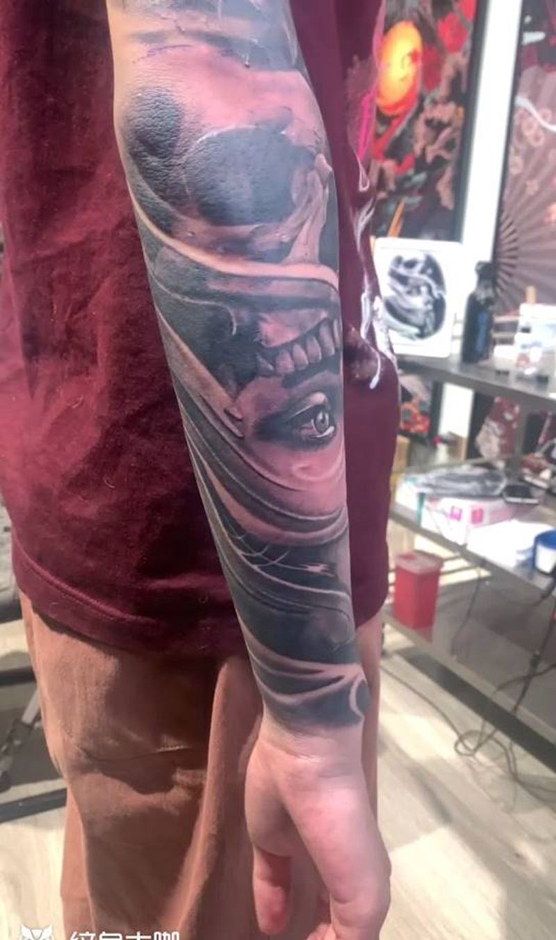 欧美写实纹身图片_手臂欧美写实纹身图案