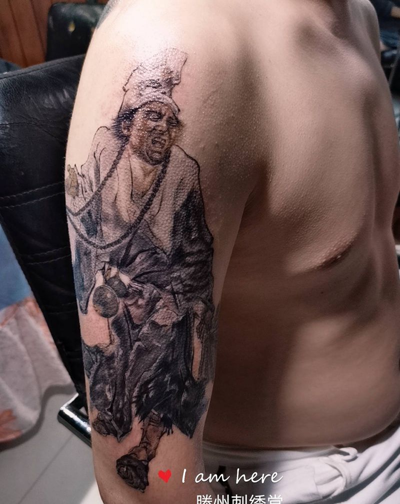 水墨济公纹身图片_手臂新传统纹身图案