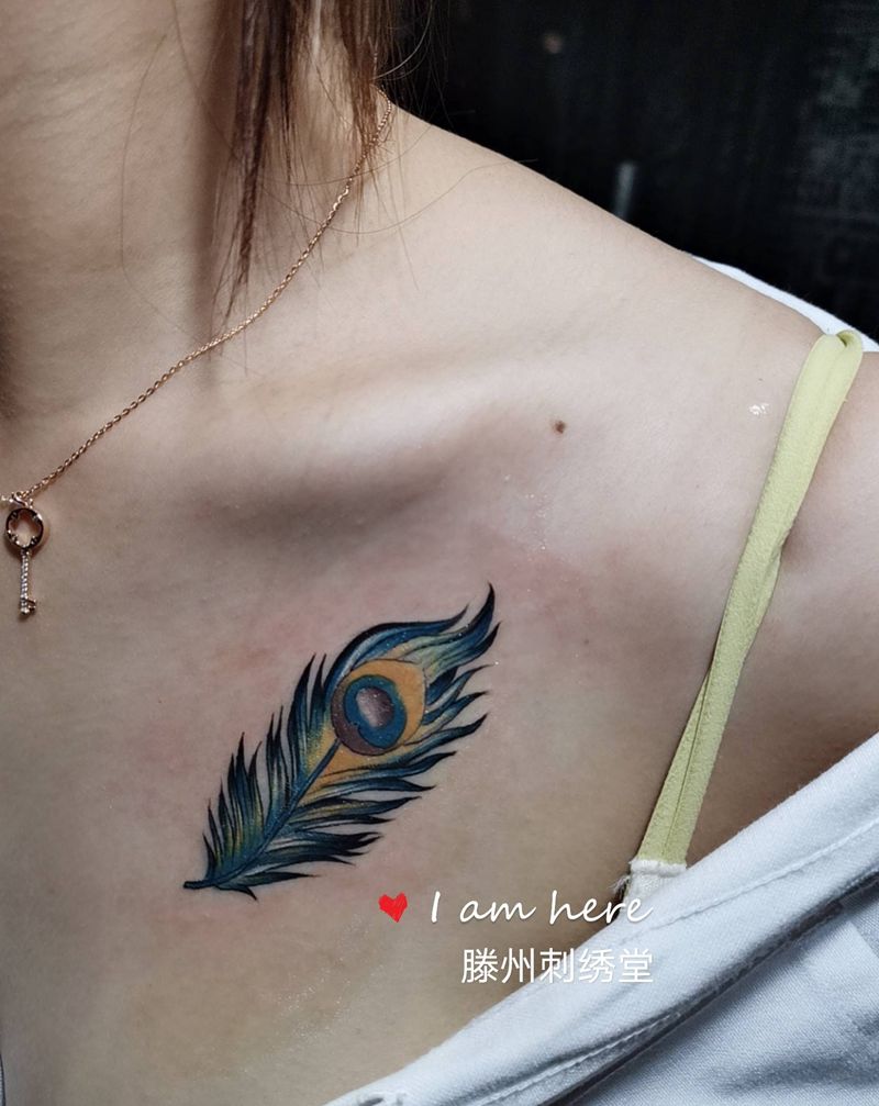 羽毛纹身图片_胸部老传统纹身图案