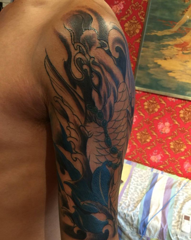 锦鲤未完纹身图片