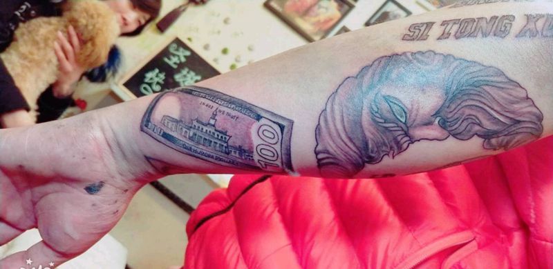 100美金纹身图片