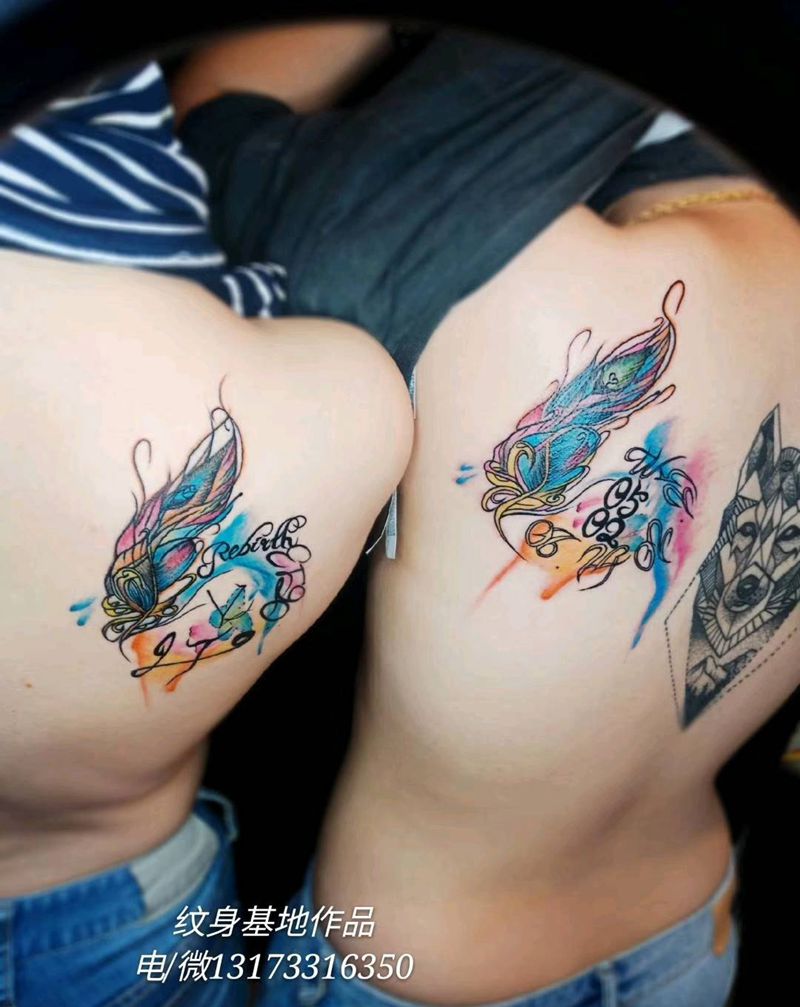 彩色泼墨羽毛，文字设计纹身图片