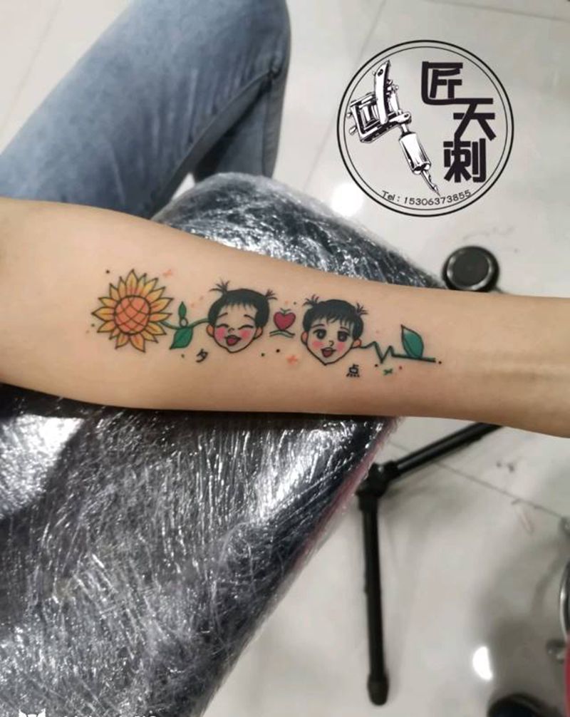 卡通纹身图片_手臂水彩水墨纹身图案