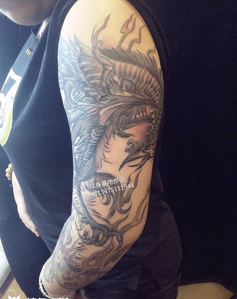 凤凰花臂纹身图片