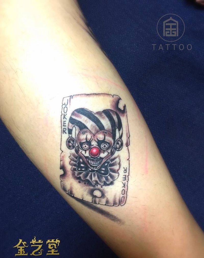 小丑扑克牌纹身图片_成品腿部欧美人物写实纹身图案