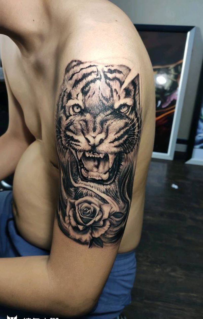 心有猛虎细嗅蔷薇纹身图片_手臂欧美写实纹身图案