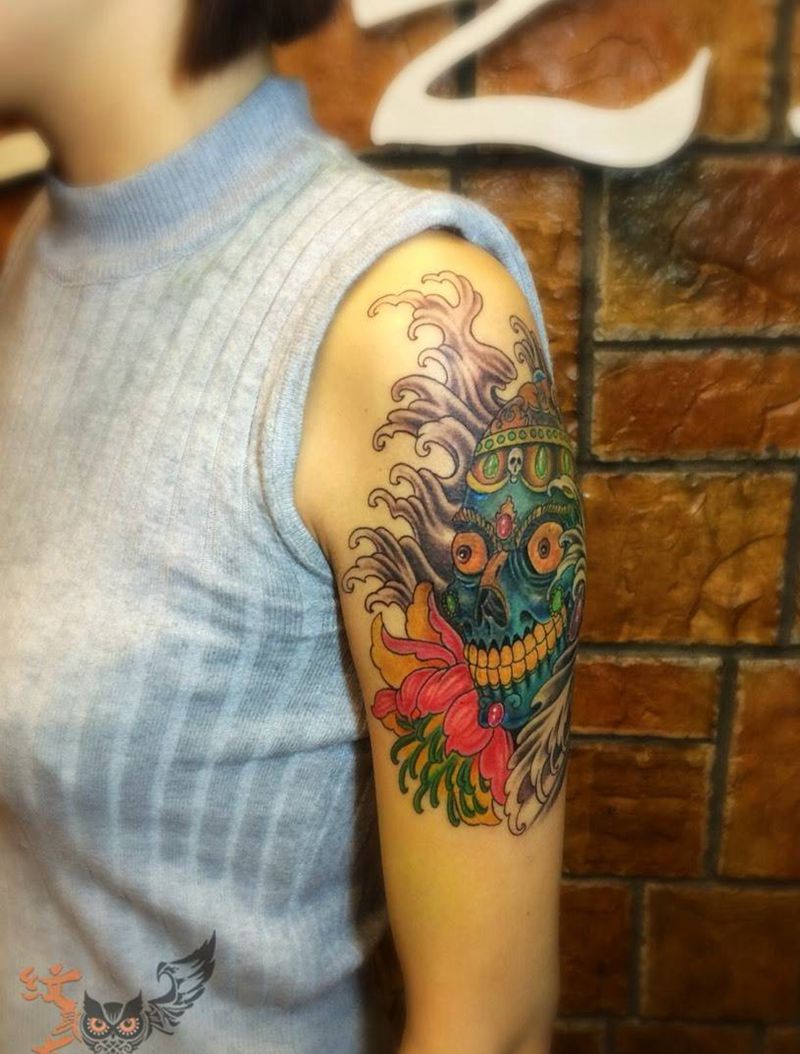 彩色嘎巴拉纹身图片_成品肩部传统宗教鬼神大臂纹身图案