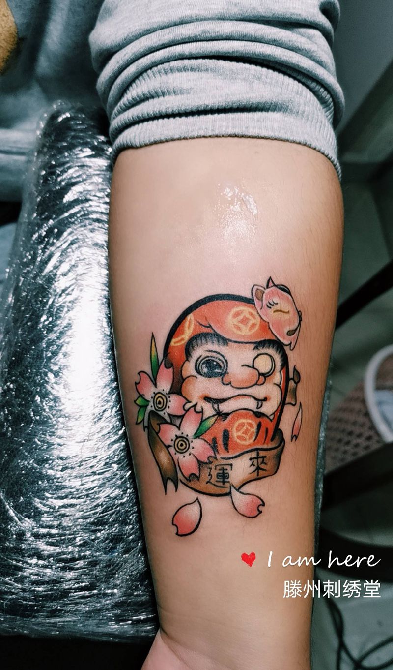 达摩蛋纹身图片_手臂纹身图案