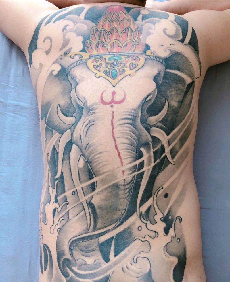 象神修改前后纹身图片_背部老传统纹身图案