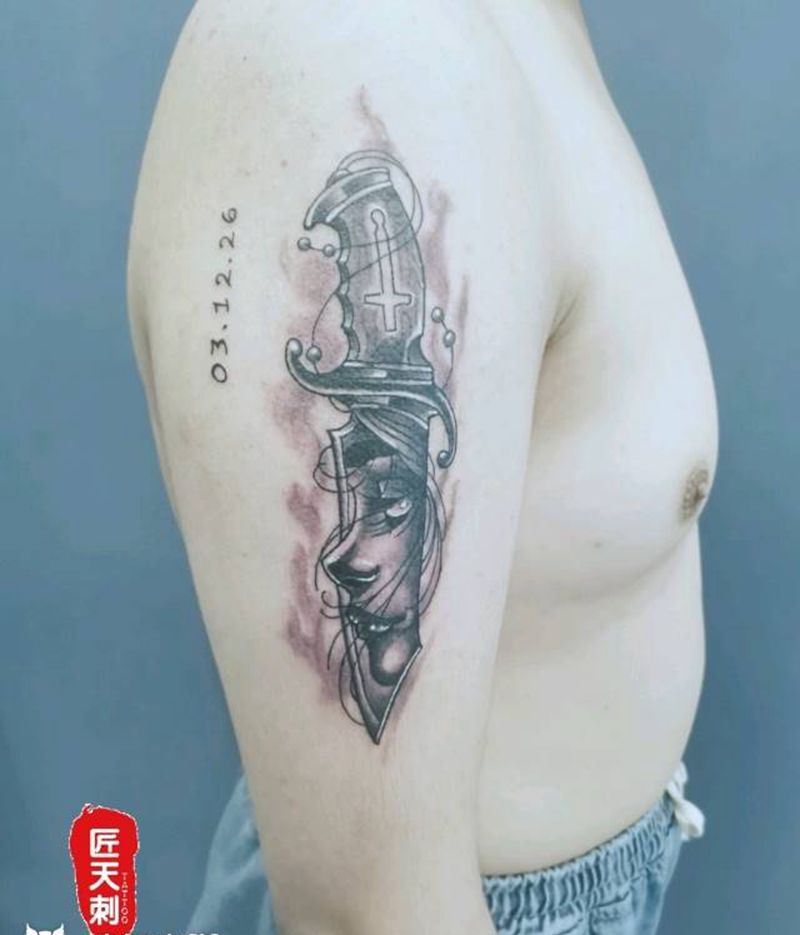 匕首纹身图片_手臂New School欧美写实纹身图案