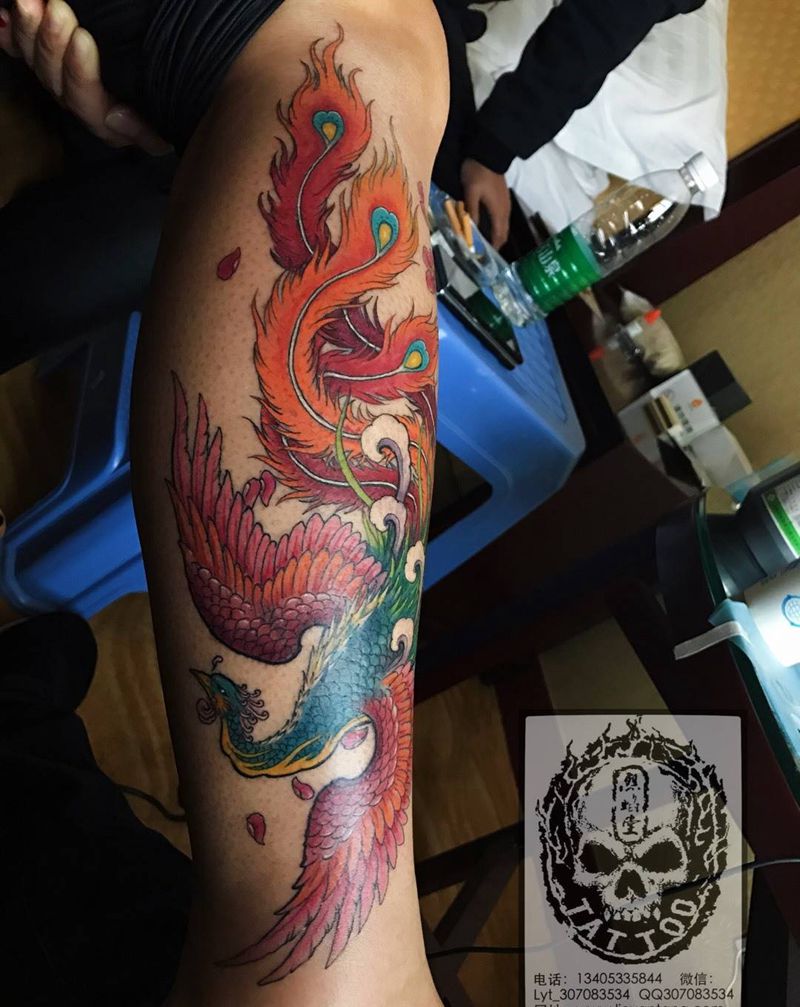 凤凰遮盖小鱼纹身图片_成品腿部传统动物遮盖作品修改纹身图案
