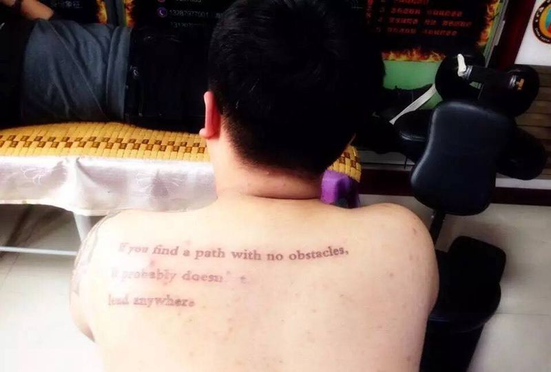 后背纹身图片_背部传统字符纹身图案