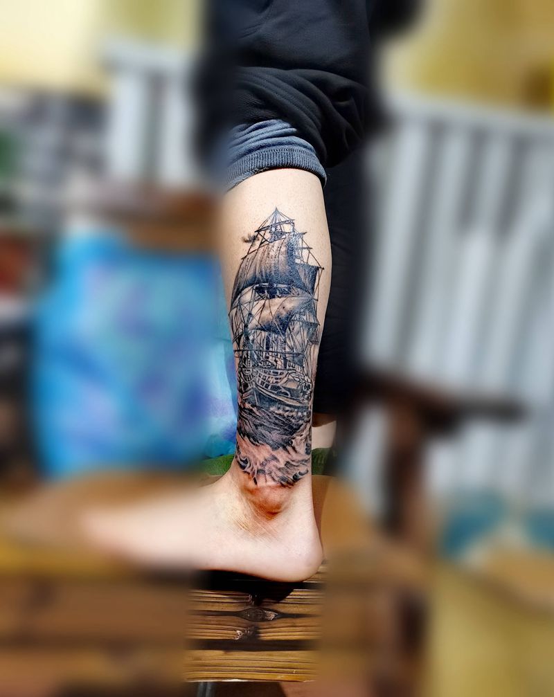 乘风破浪纹身图片_腿部纹身图案