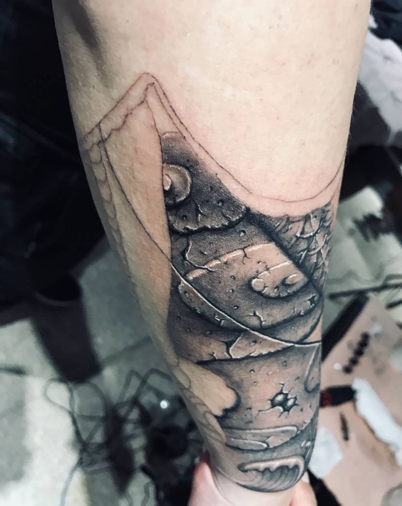 雕龙臂纹身图片_手臂欧美写实石雕机械纹身图案