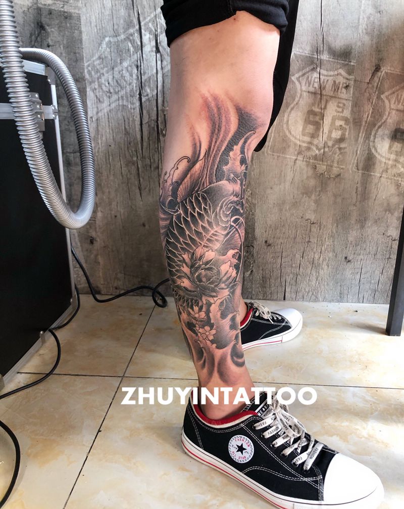 鱼纹身图片_腿部纹身图案